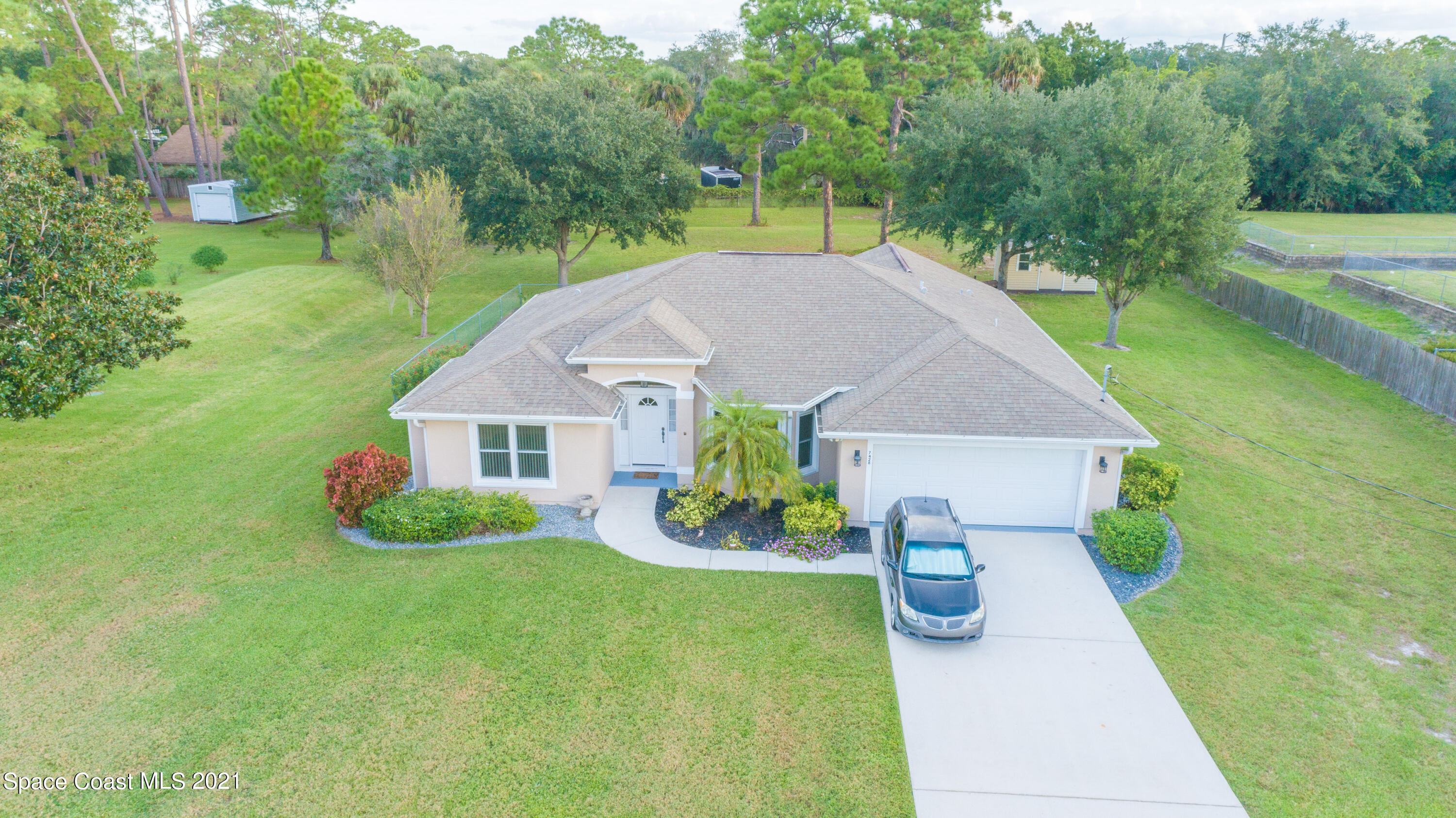 7428 Rodes Place Melbourne, FL 32904 - Photo 2 of 28 DJI_0001
