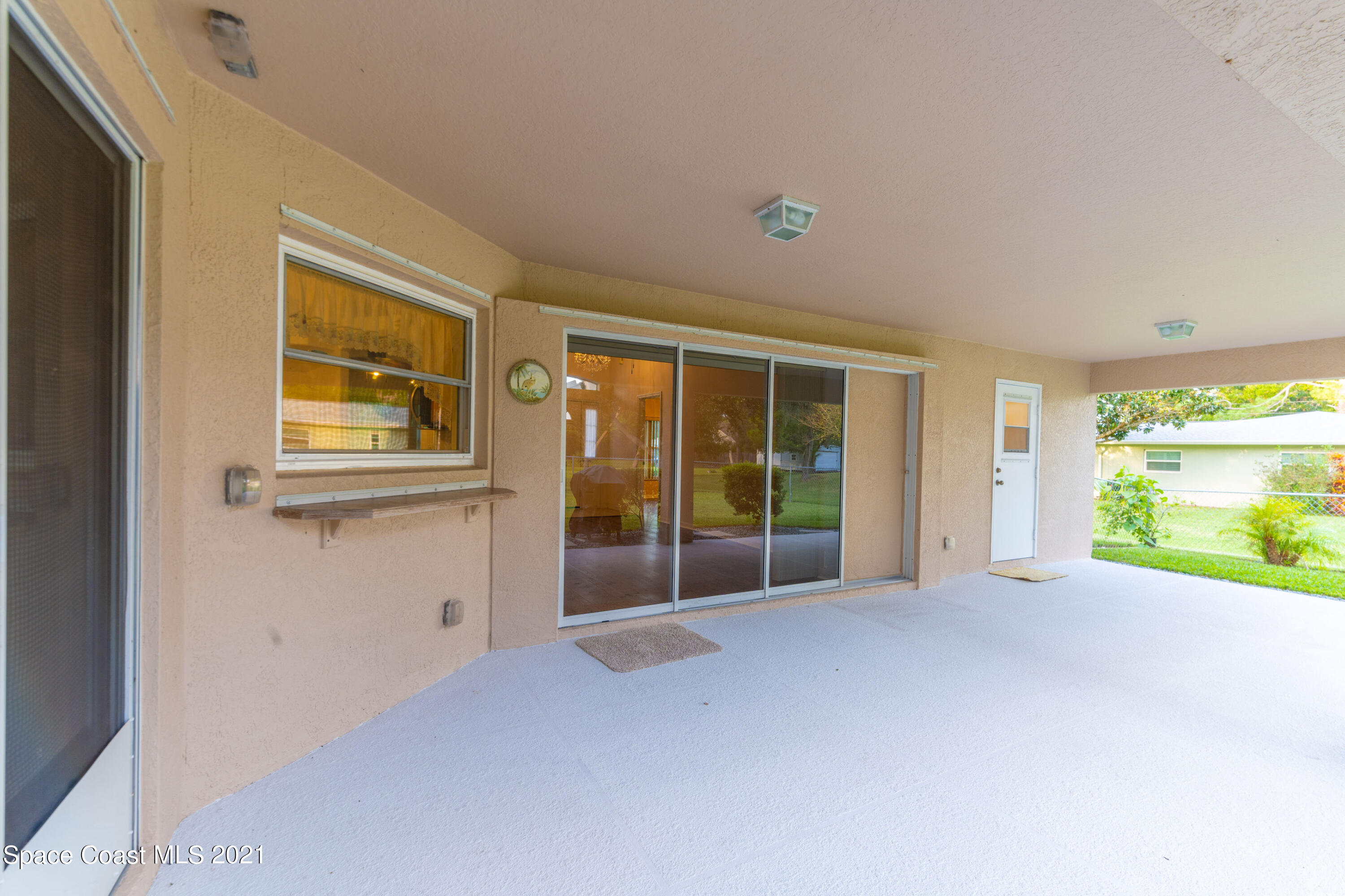 7428 Rodes Place Melbourne, FL 32904 - Photo 20 of 28 NZ7_9867