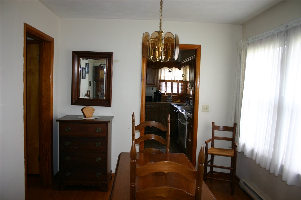 86 Fadley Road Weyers Cave, VA 24486 - Photo 13 of 21 a hallway with chairs and a window