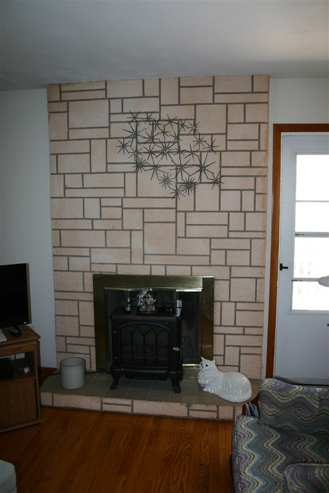 86 Fadley Road Weyers Cave, VA 24486 - Photo 14 of 21 a living room with a fireplace