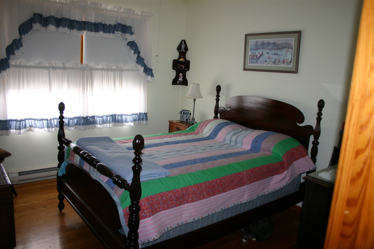 86 Fadley Road Weyers Cave, VA 24486 - Photo 15 of 21 a bedroom with bed and window