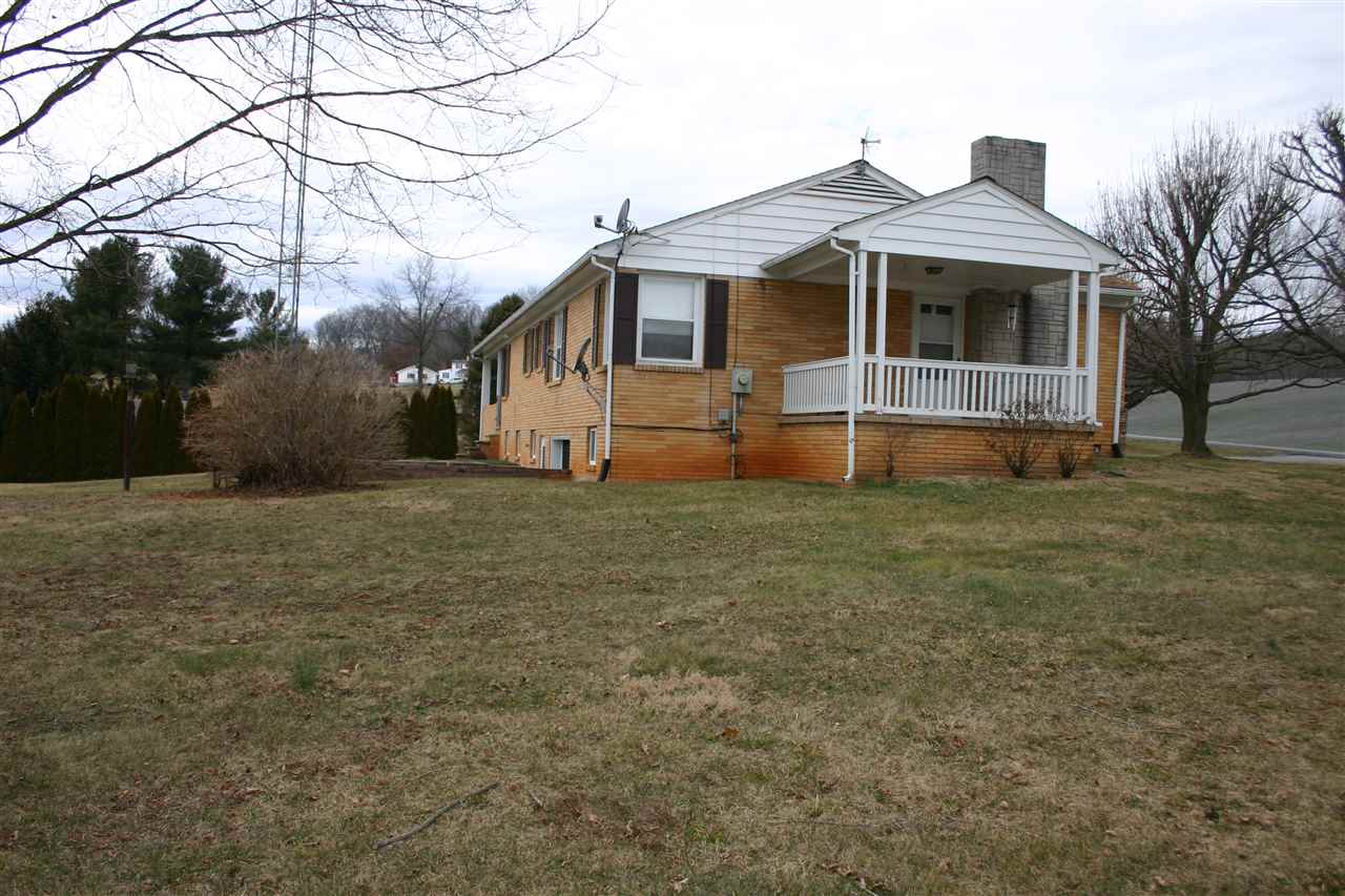 86 Fadley Road Weyers Cave, VA 24486 - Photo 3 of 21 a front view of a house with a yard