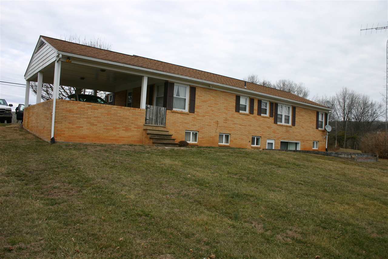 86 Fadley Road Weyers Cave, VA 24486 - Photo 6 of 21 a front view of a house with a yard