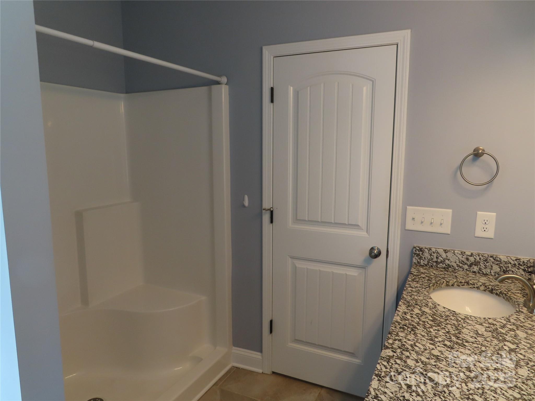 2127 Cedar Road York, SC 29745 - Photo 19 of 23 a bathroom with a granite countertop shower and a sink