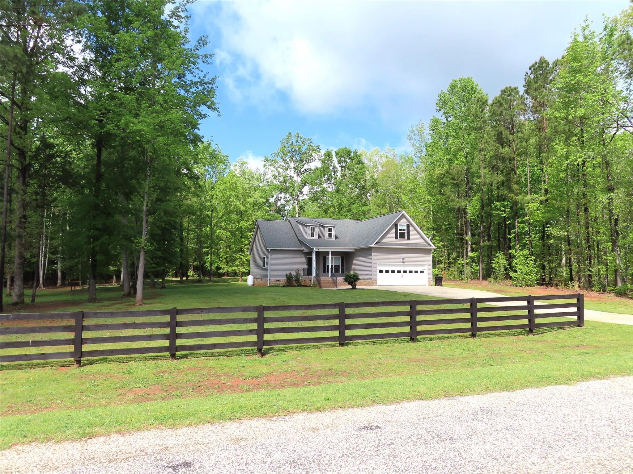 2127 Cedar Road York, SC 29745 - Photo 2 of 23 a front view of a house with a yard