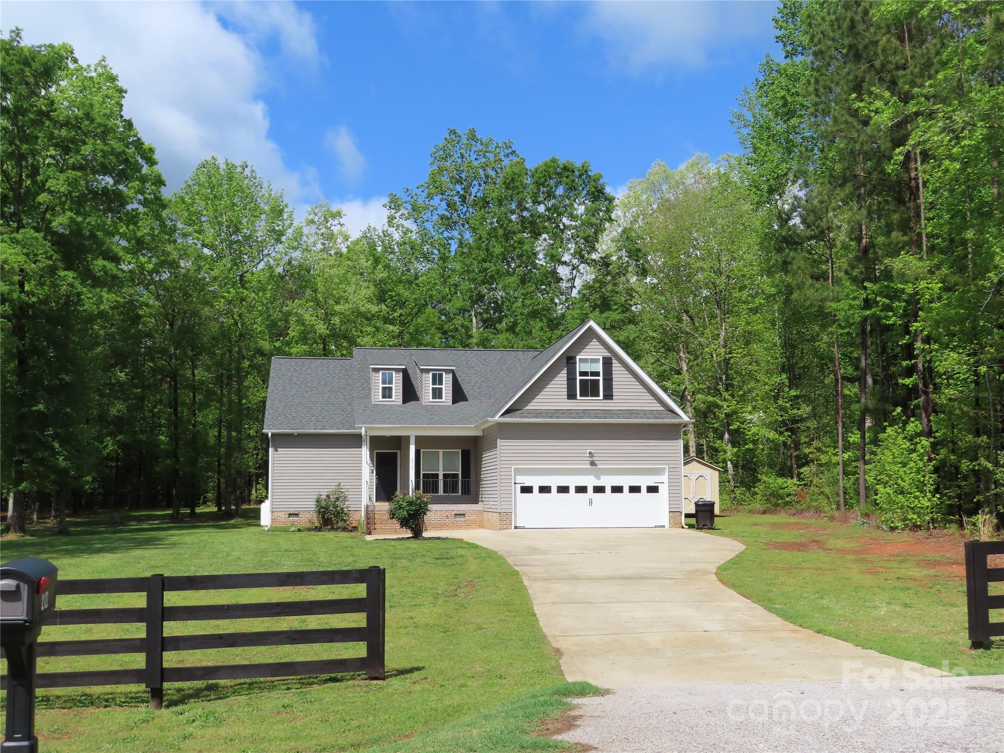2127 Cedar Road York, SC 29745 - Photo 4 of 23 a front view of a house with a yard