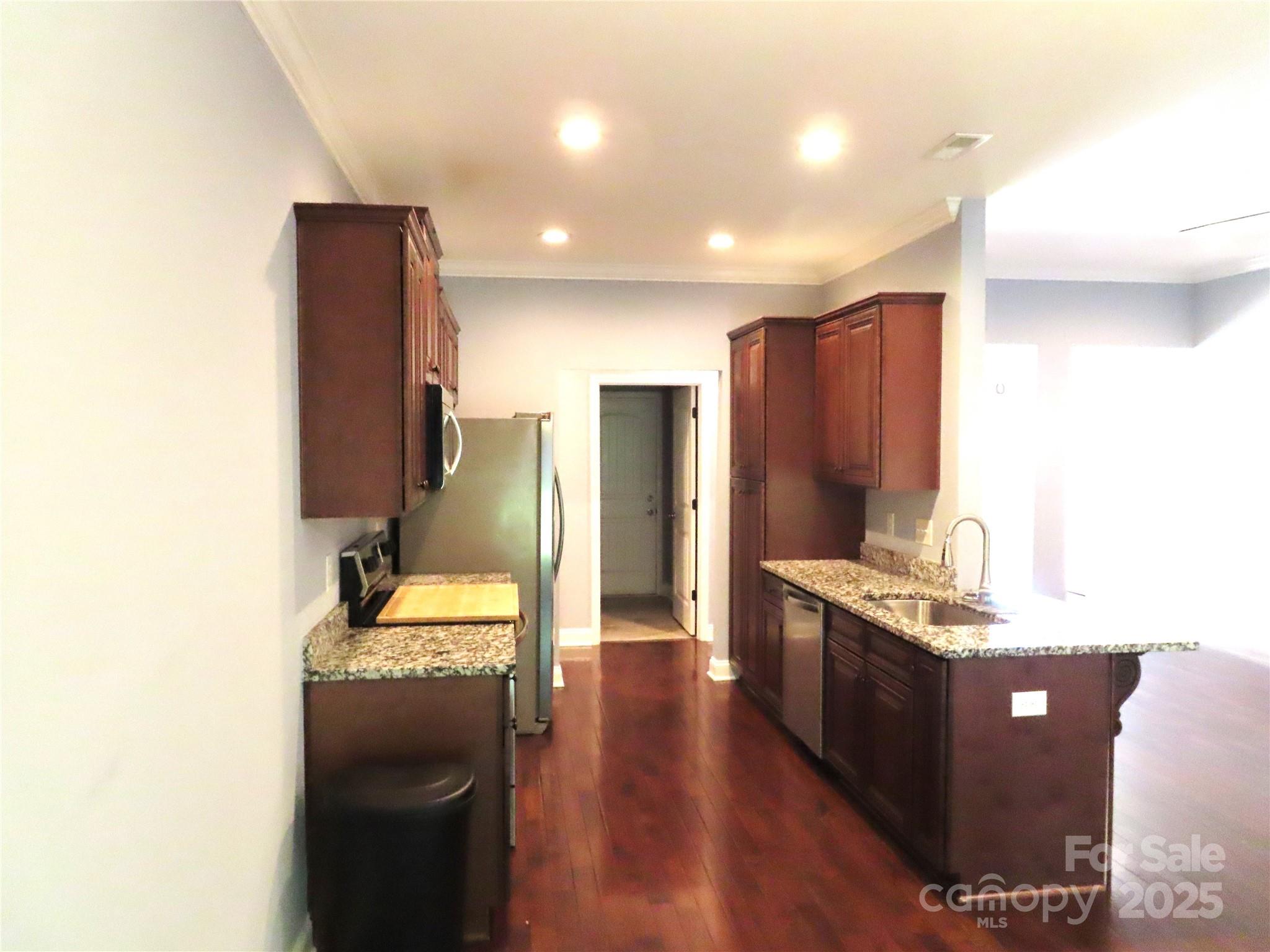 2127 Cedar Road York, SC 29745 - Photo 8 of 23 a kitchen with stainless steel appliances granite countertop a refrigerator a stove and a sink