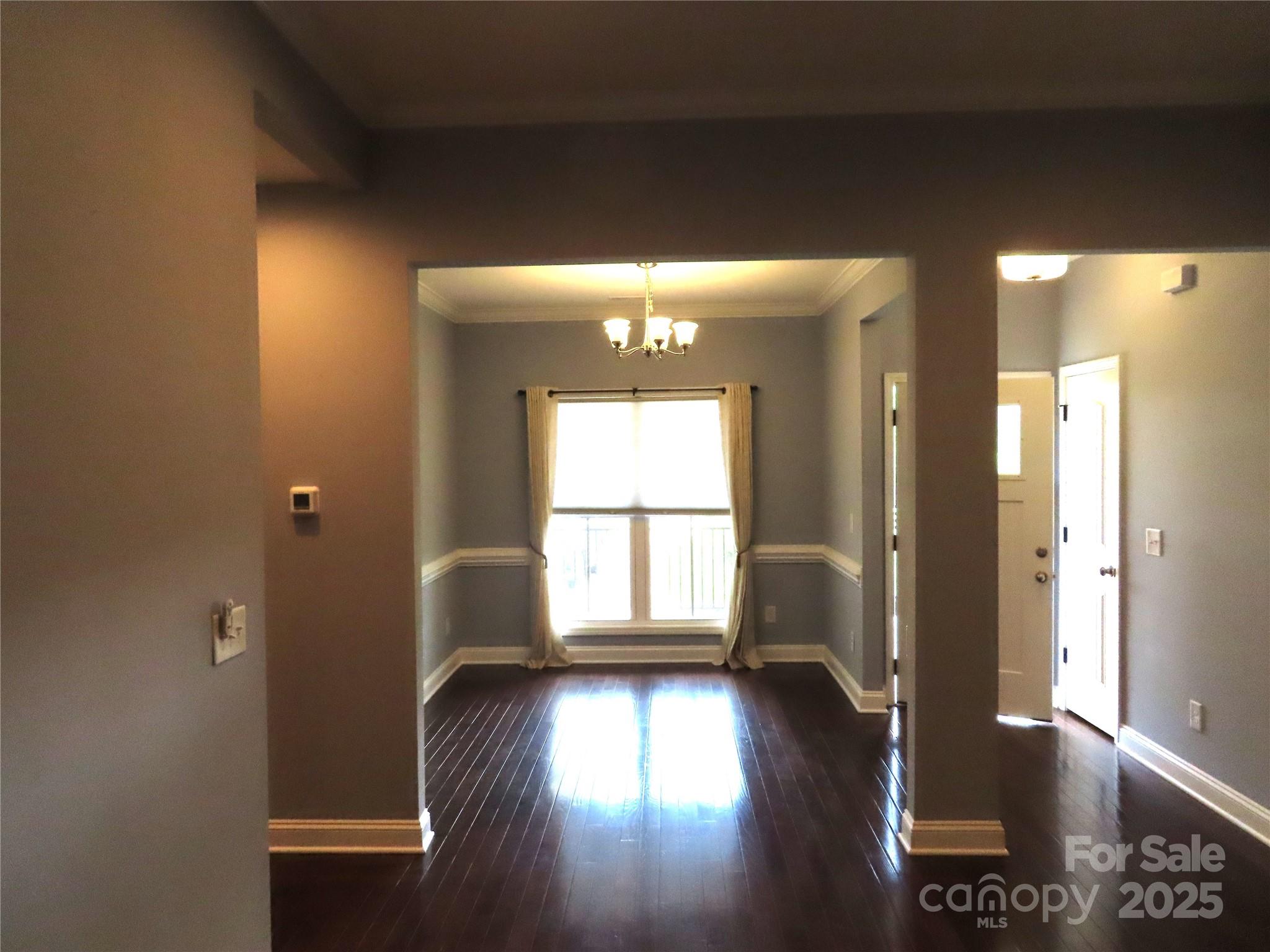 2127 Cedar Road York, SC 29745 - Photo 9 of 23 a view of a hallway with wooden floor and furniture
