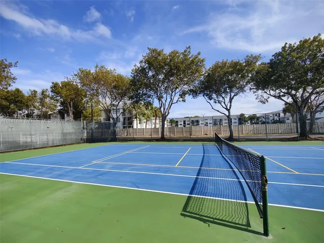 a view of outdoor space and tennis court