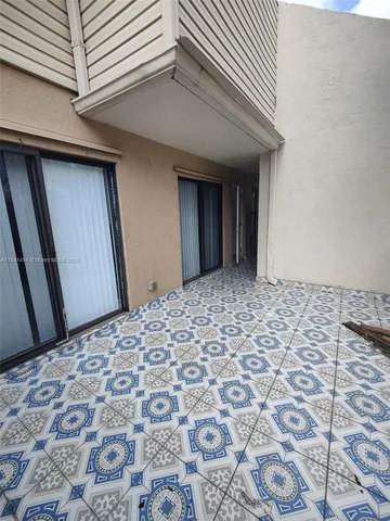 a bathroom with a sink and shower