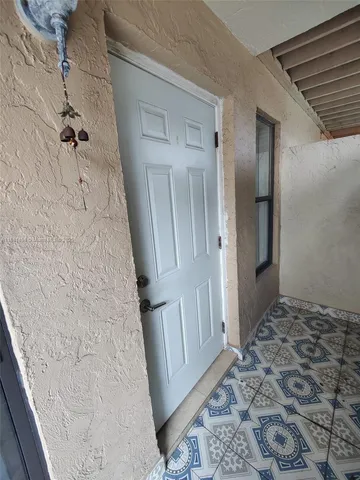 a kitchen with stainless steel appliances granite countertop wooden cabinets a sink and dishwasher