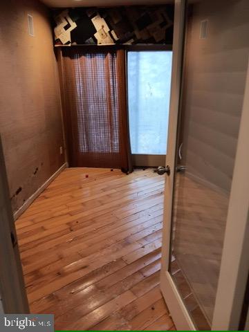 5 Mill Lane Linwood, NJ 08221 - Photo 16 of 44 a view of an empty room with a wooden door