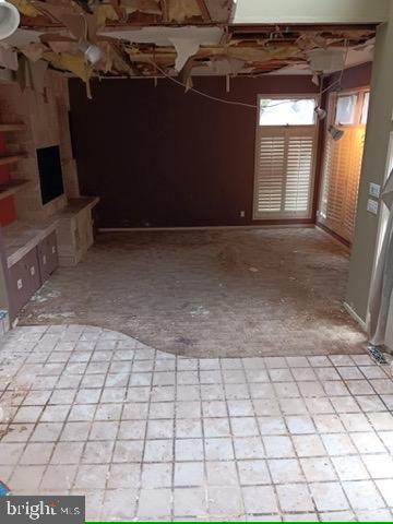 5 Mill Lane Linwood, NJ 08221 - Photo 32 of 44 a view of a livingroom with an empty space and a fireplace