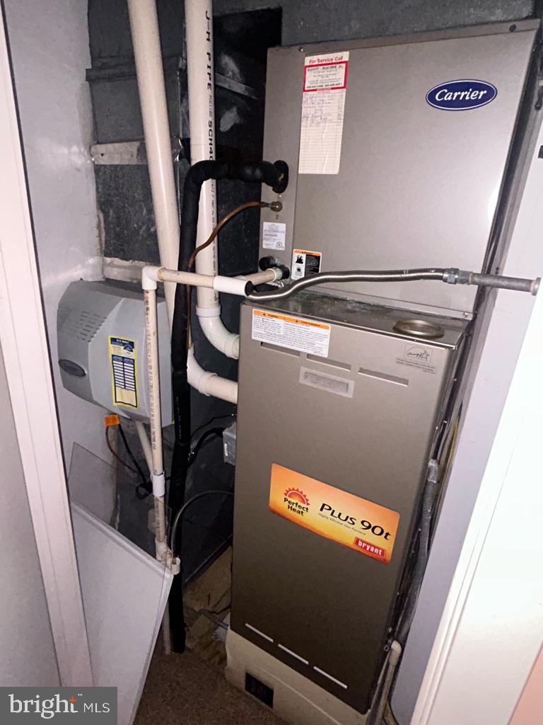 5 Mill Lane Linwood, NJ 08221 - Photo 38 of 44 a view of utility room with racks on the wall