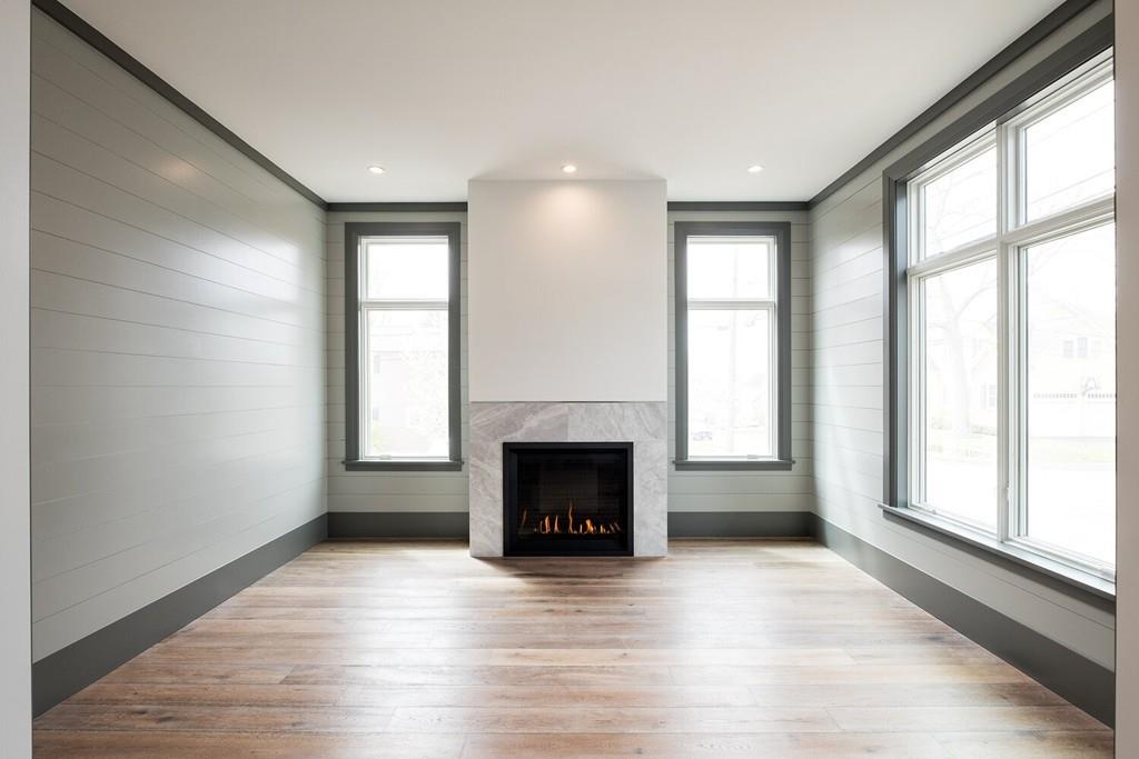 168 Bridle Trail Road Needham, MA 02492 - Photo 8 of 28 a view of an empty room with a window and fireplace