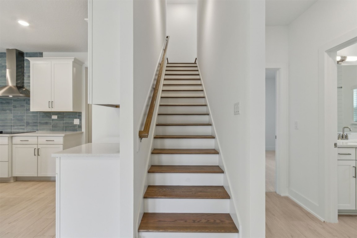 96088 Pirates Bluff Road Yulee, FL 32097 - Photo 17 of 25 a view of entryway and hall with wooden floor