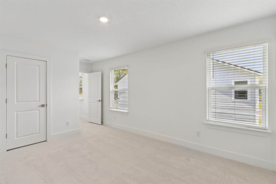 96088 Pirates Bluff Road Yulee, FL 32097 - Photo 20 of 25 a view of an empty room with a window