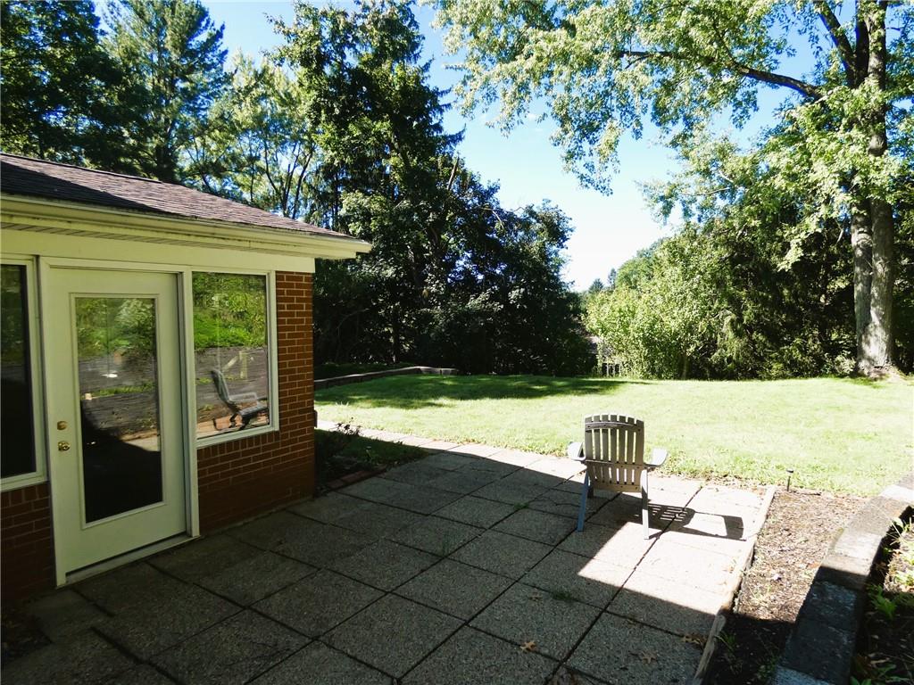 8459 Ridgemont Road Pittsburgh, PA 15237 - Photo 31 of 31 Exit from your sunroom onto this large private rear patio