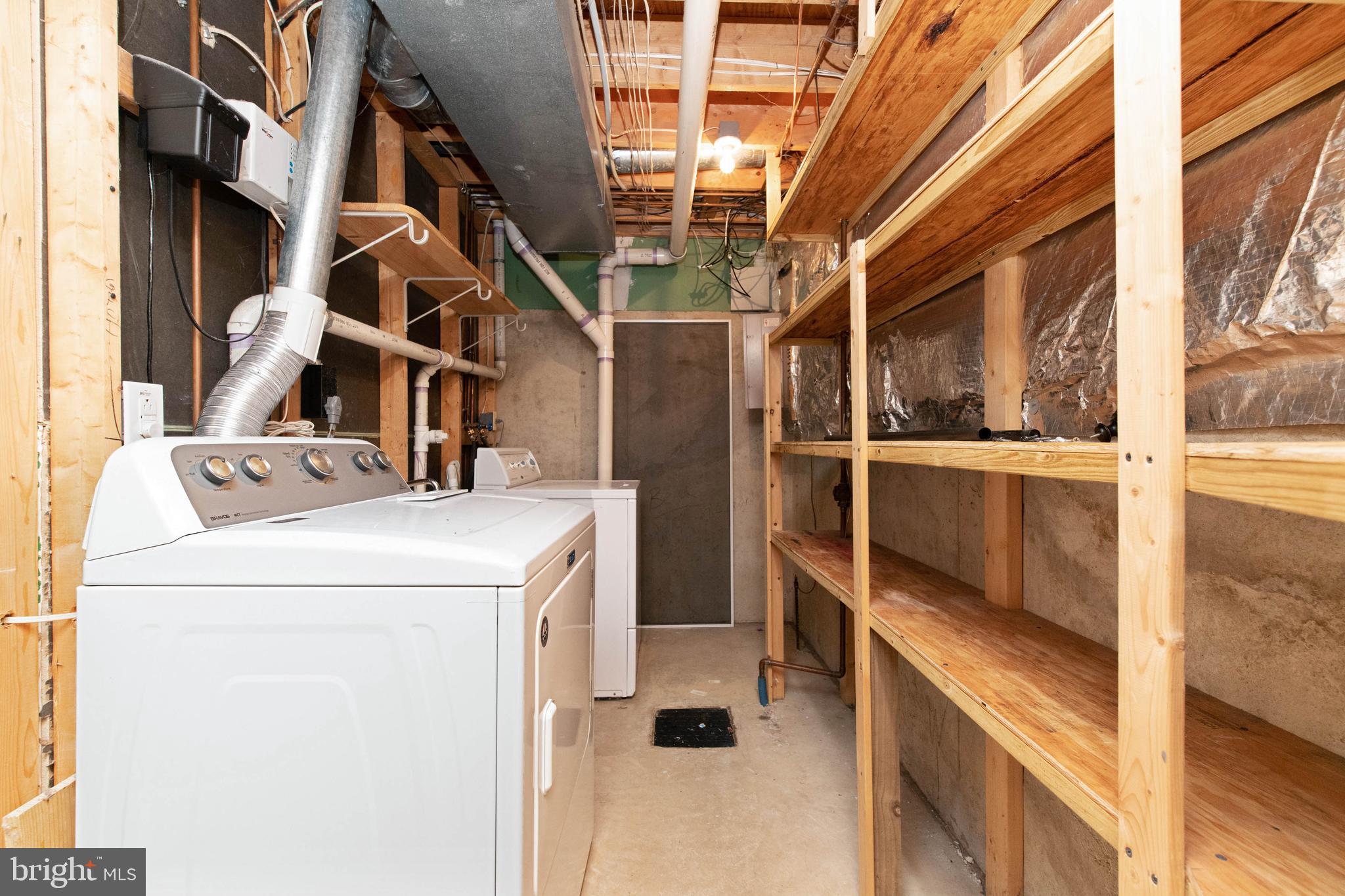 4403 Cole Farm Road Baltimore, MD 21236 - Photo 25 of 30 a utility room with dryer and washer