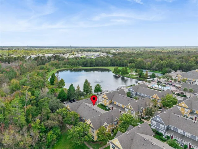 an aerial view of lake and mountain view