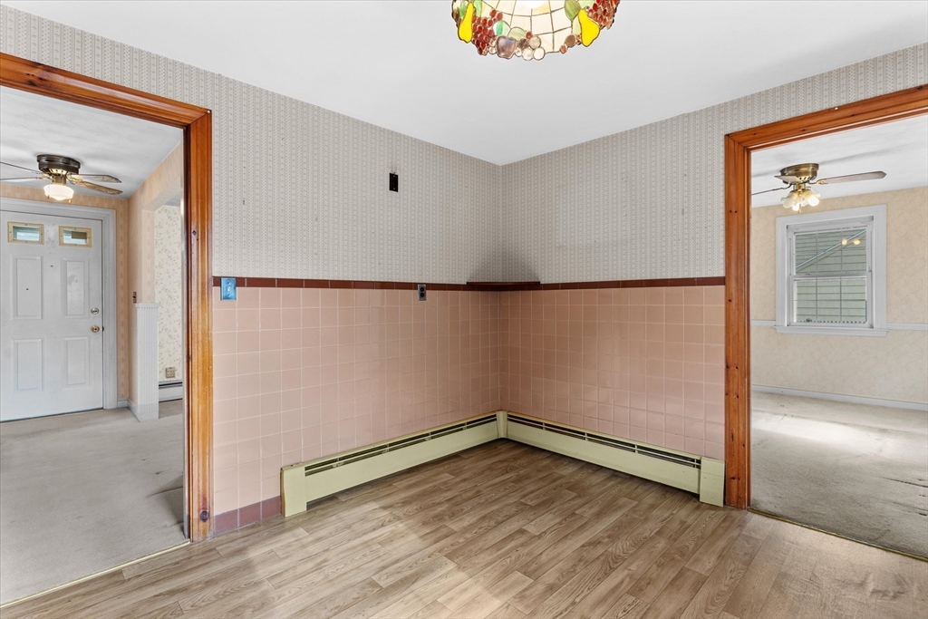 9 Pershing Road Salem, MA 01970 - Photo 14 of 42 an empty room with wooden floor