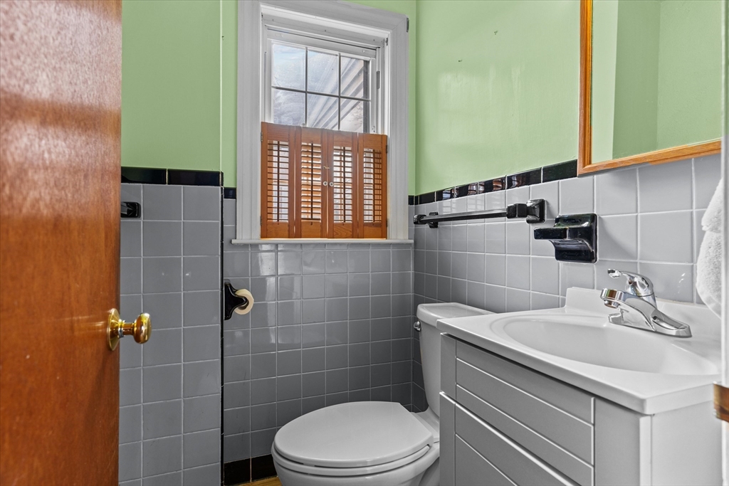 9 Pershing Road Salem, MA 01970 - Photo 15 of 42 a bathroom with a sink a toilet and shower