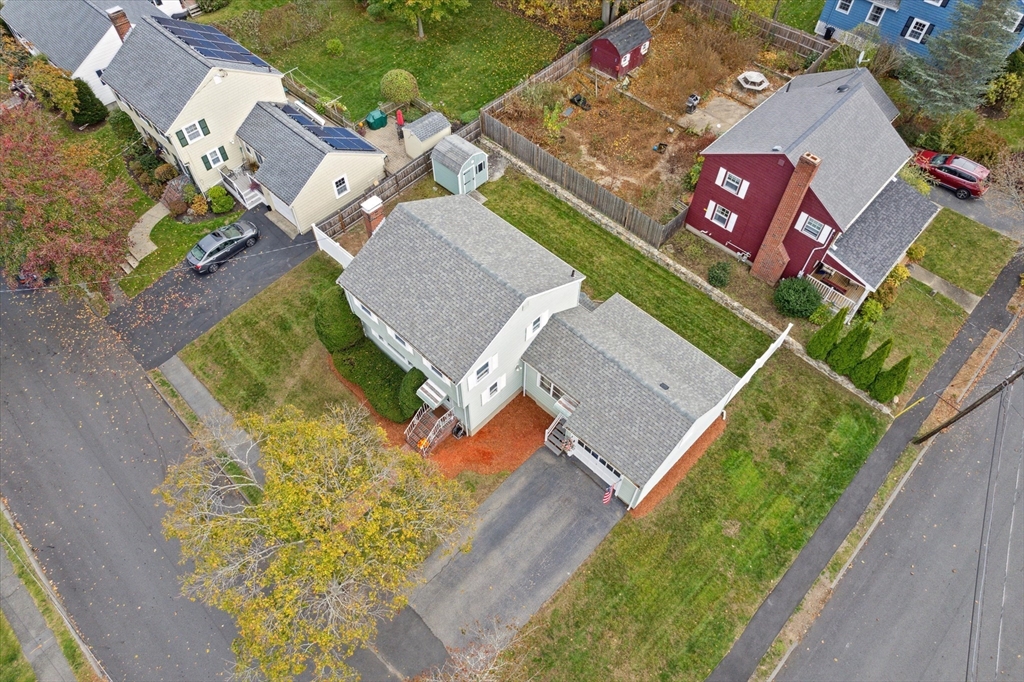 9 Pershing Road Salem, MA 01970 - Photo 34 of 42 an aerial view of a house with a garden and swimming pool
