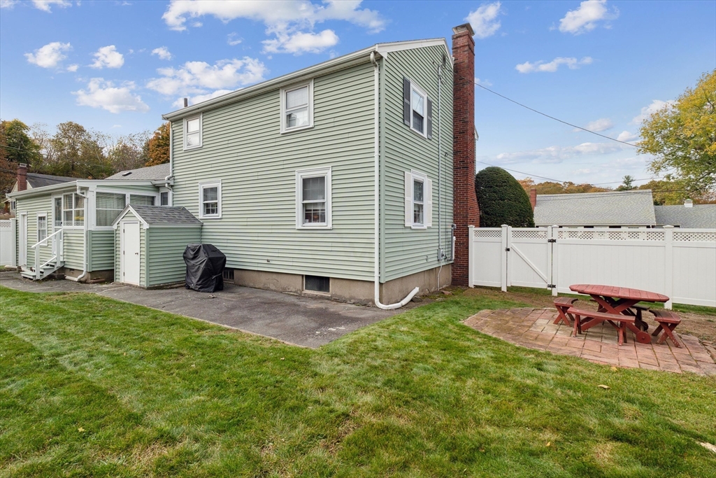 9 Pershing Road Salem, MA 01970 - Photo 38 of 42 a view of a house with backyard and sitting area