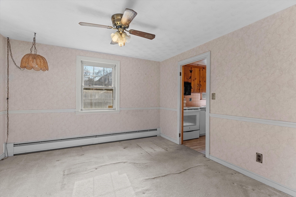 9 Pershing Road Salem, MA 01970 - Photo 8 of 42 a view of an empty room with a window