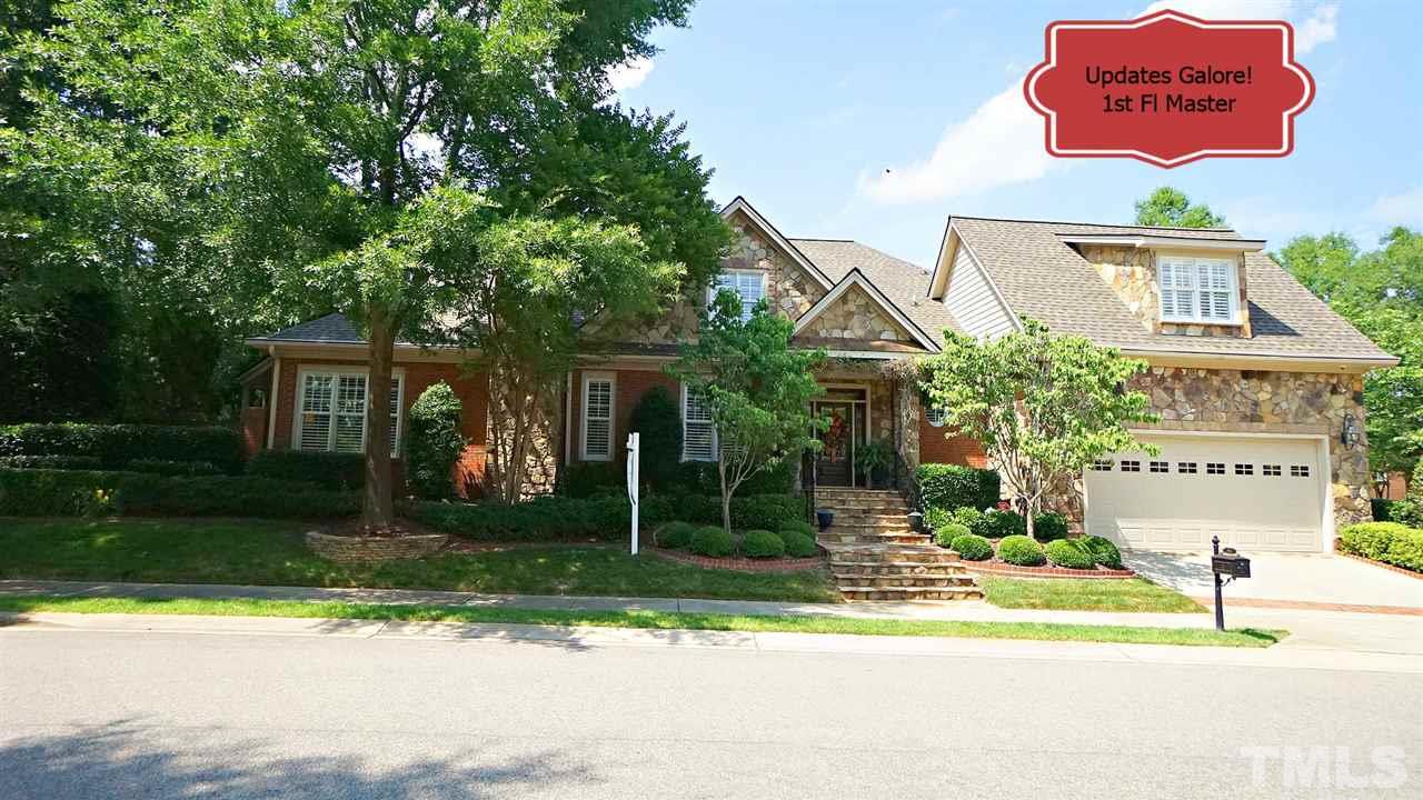 All brick & stone exterior, corner lot, quaint look of an English cottage in the heart of North Raleigh.  Minutes to shopping, restaurants, grocery, I-540, I-440, & so much more