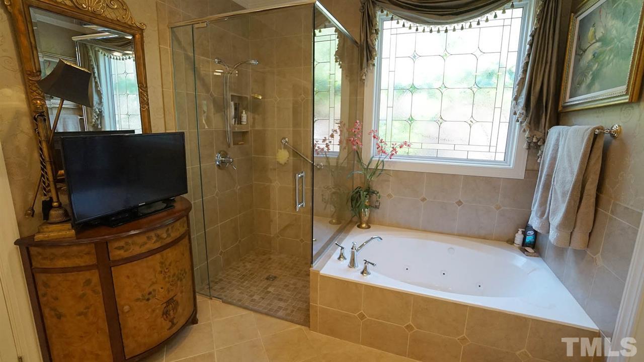 1900 Torrington Street Raleigh, NC 27615 - Photo 14 of 30 New in 2018-wheelchair accessible master shower. New shower glass & surround
