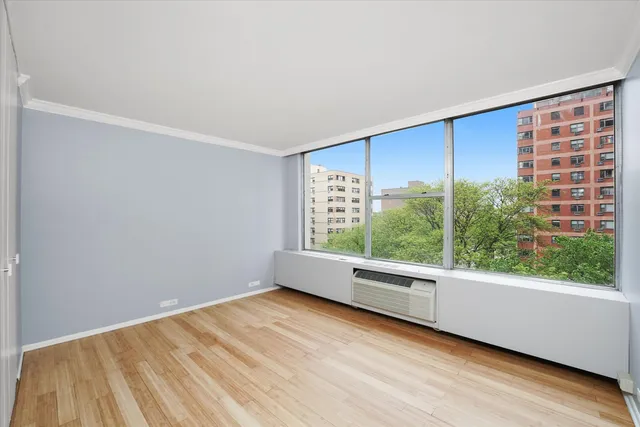 a view of an empty room and window