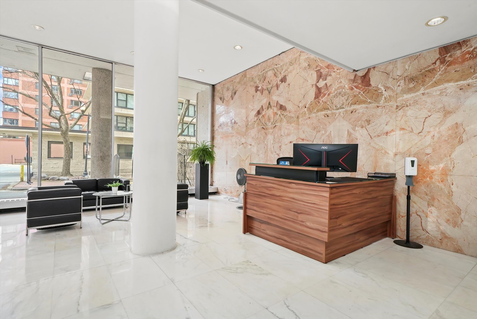 5757 North Sheridan Road, Unit 5J Chicago, IL 60660 - Photo 25 of 44 a bedroom with furniture and flat screen tv