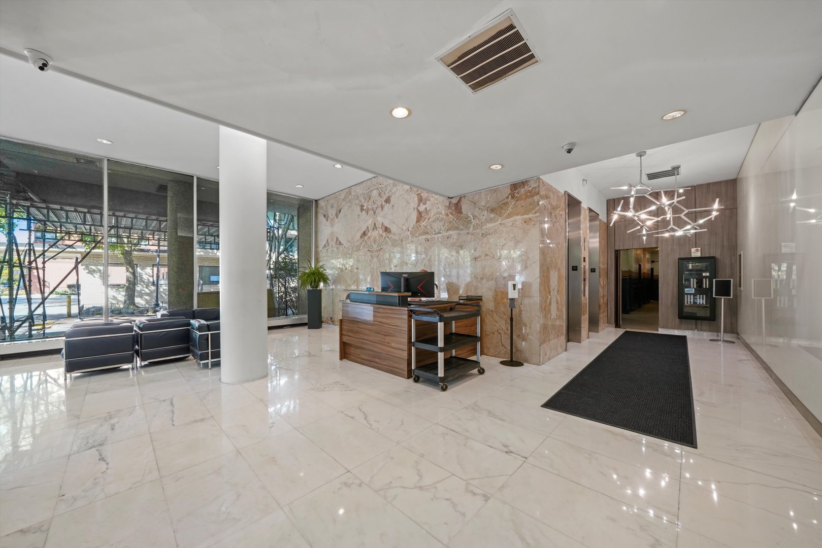 5757 North Sheridan Road, Unit 5J Chicago, IL 60660 - Photo 26 of 44 a living room with furniture and a large window