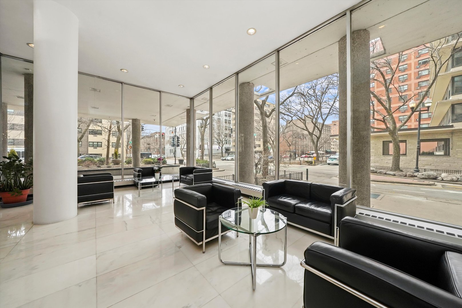 5757 North Sheridan Road, Unit 5J Chicago, IL 60660 - Photo 27 of 44 a living room with furniture and a large window