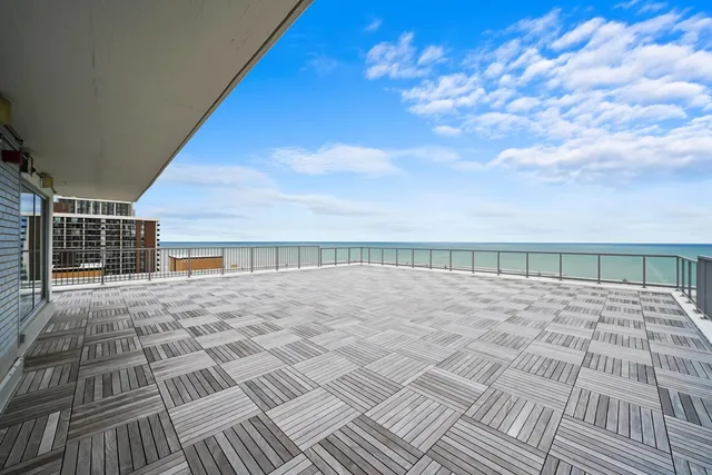 a balcony with a city view