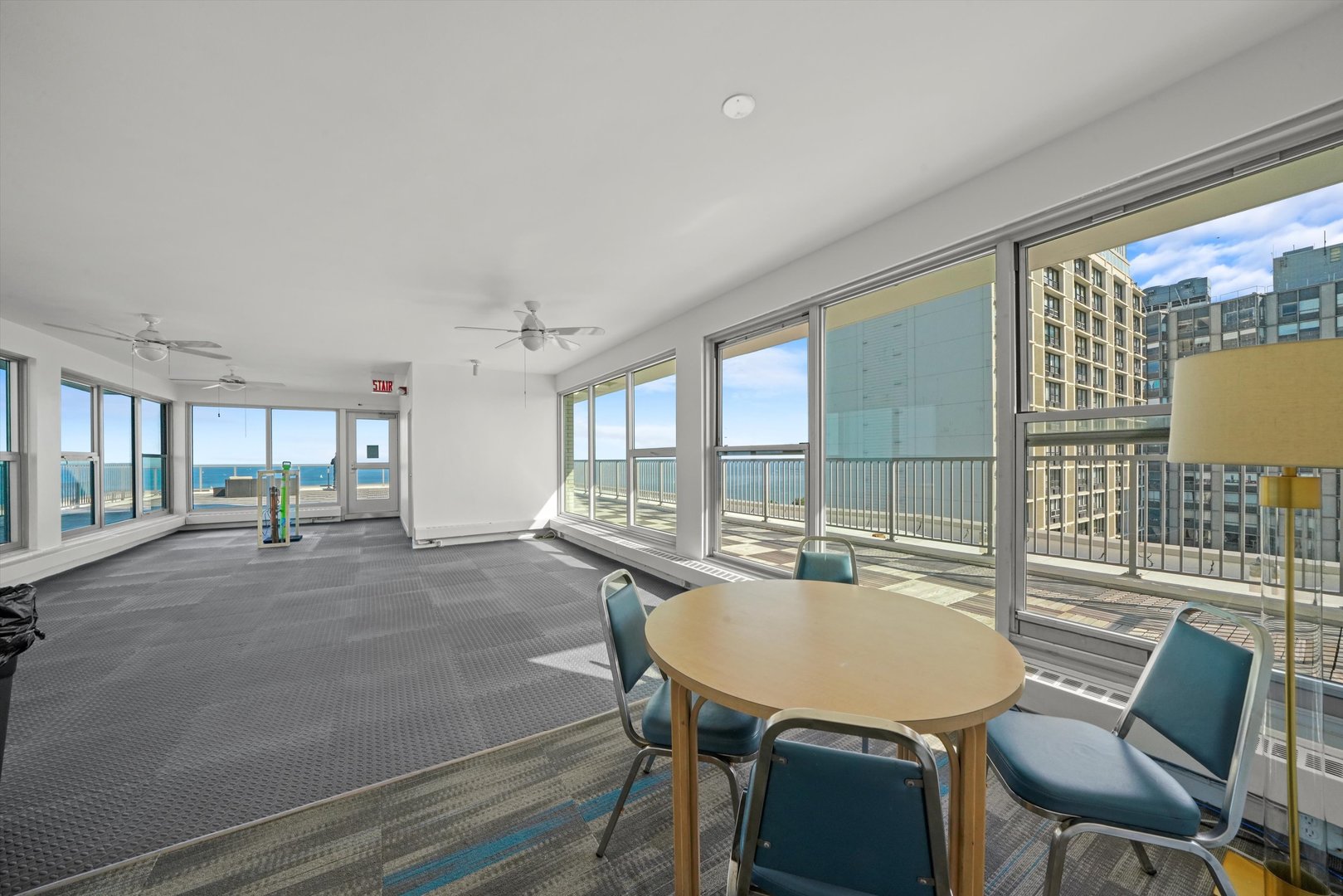 5757 North Sheridan Road, Unit 5J Chicago, IL 60660 - Photo 36 of 44 a view of a dining room with furniture window and outside view