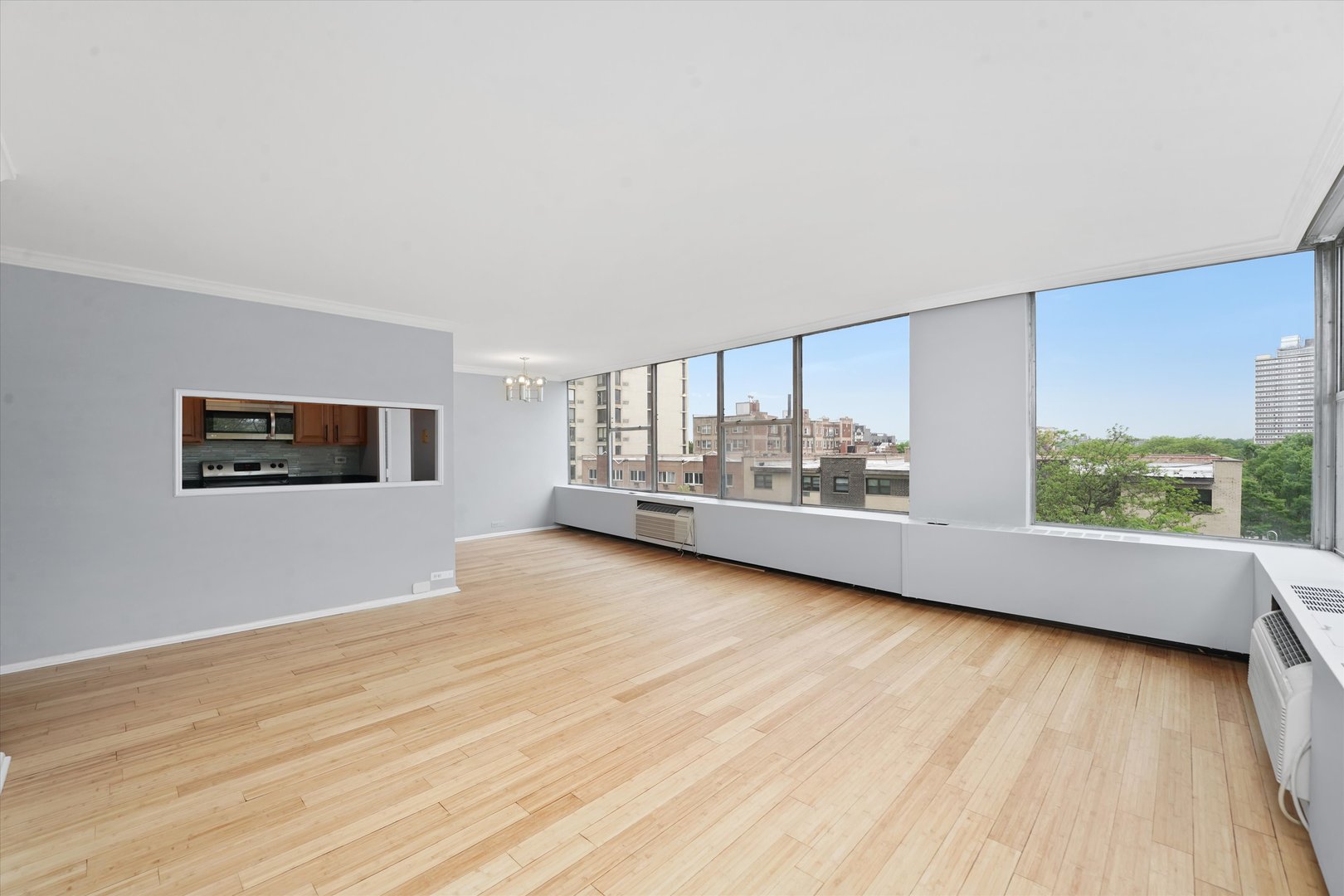 5757 North Sheridan Road, Unit 5J Chicago, IL 60660 - Photo 9 of 44 a view of an empty room with a window