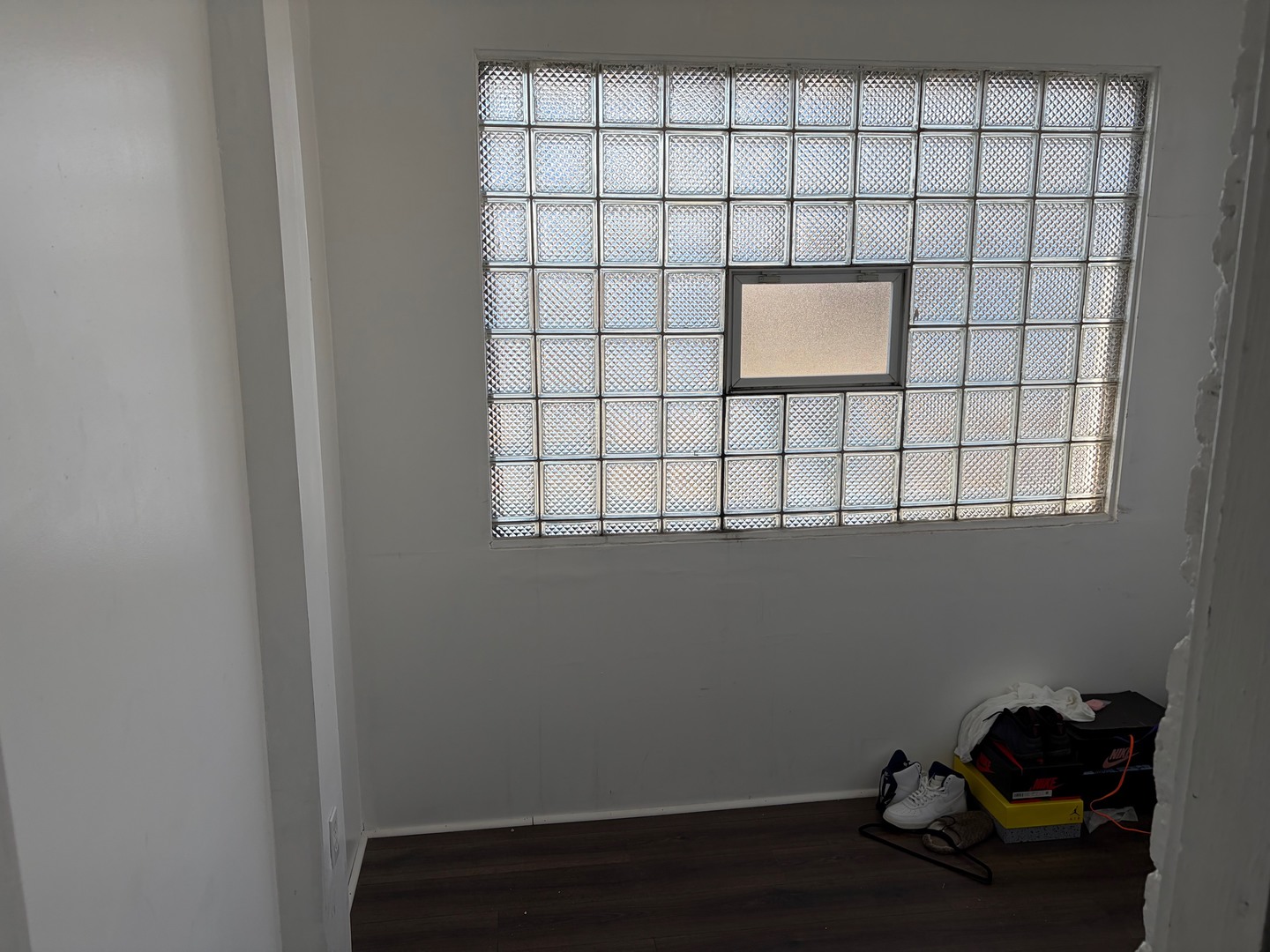 10226 South Vernon Avenue, Unit 2 Chicago, IL 60628 - Photo 11 of 14 a bathroom with a window