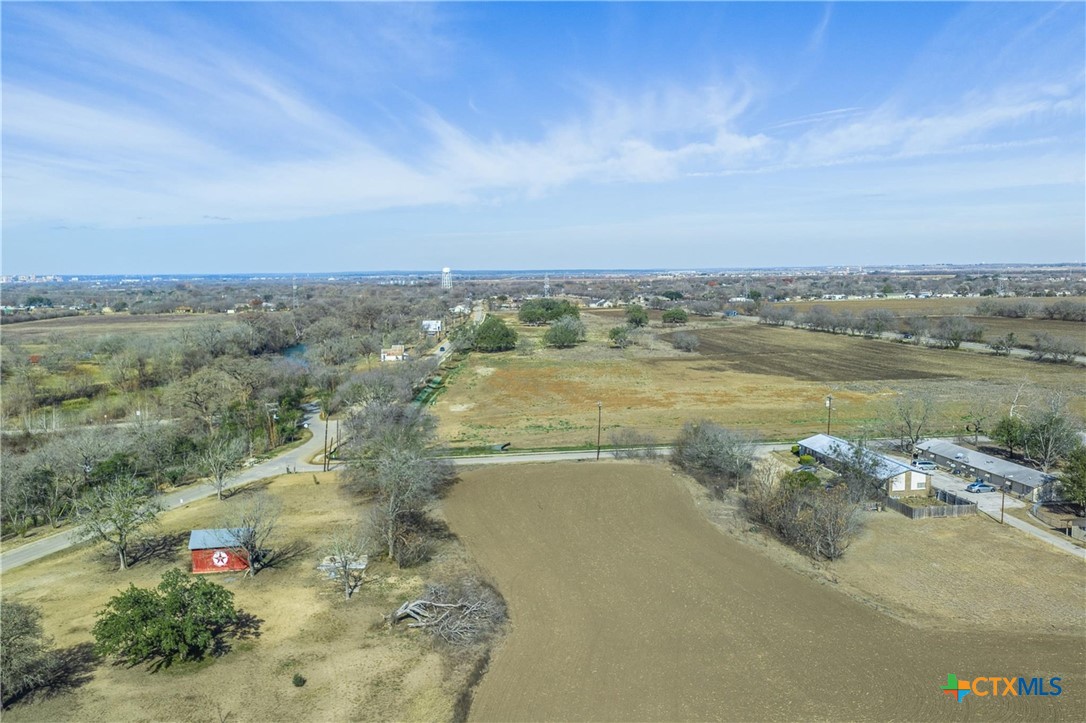 528 Northwest River Road Martindale, TX 78655 - Photo 4 of 11 a view of a lake with a mountain in the back