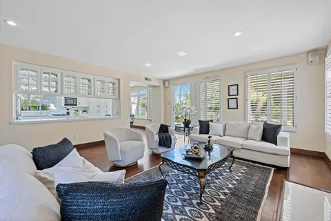 a workspace with furniture and window