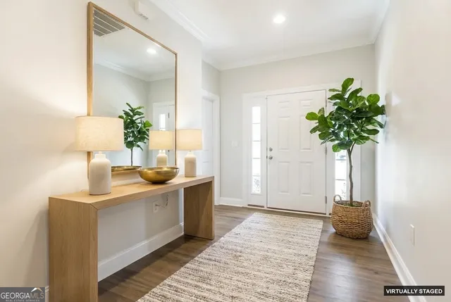 a view of kitchen with sink and natural light