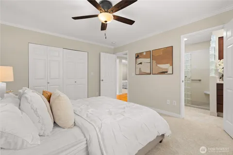 a bedroom with a bed and a walk in closet