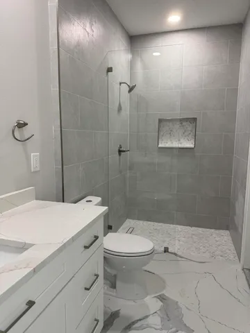 a view of a room that has a window in it