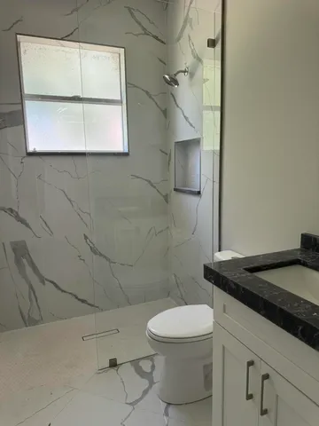 a view of a room with a sink