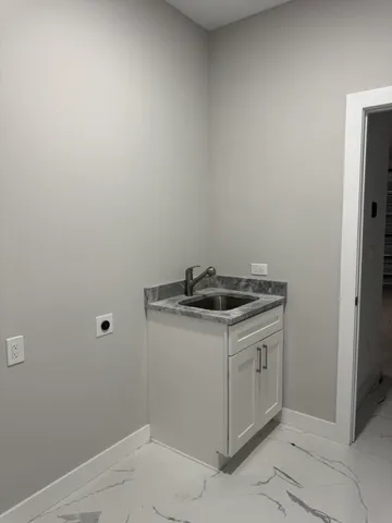 a view of a swimming pool with a lounge chairs