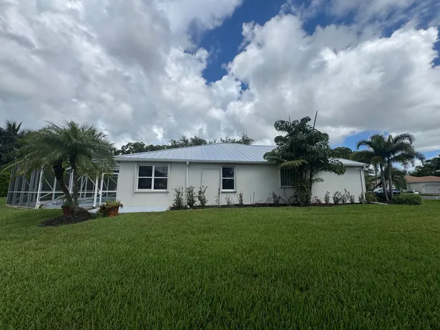 a view of a golf course with a lake
