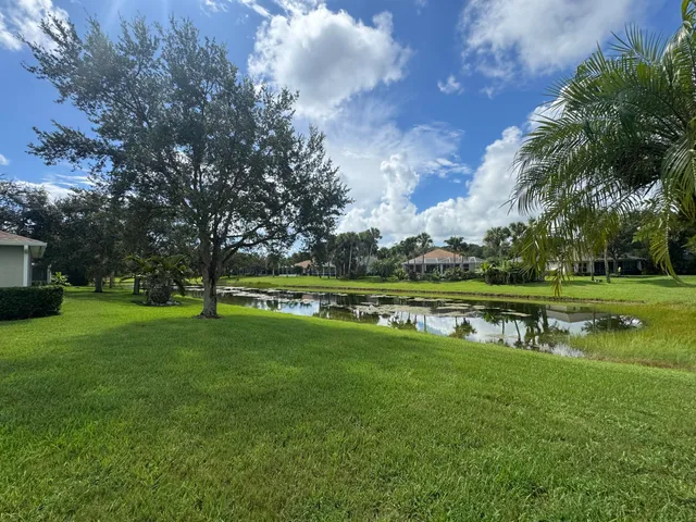 a view of a street with a house