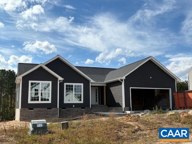 218 Riva Way Palmyra, VA 22963 - Photo 1 of 3 a front view of a house with yard