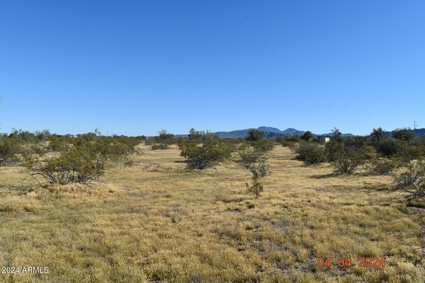 524-xx West Organ Pipe Road, Unit B Maricopa, AZ 85139 - Photo 6 of 9 a view of ocean with mountains